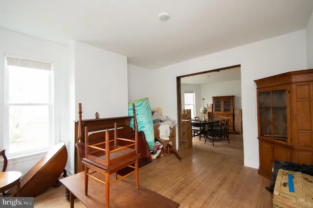a bathroom with a tub shower and a sink