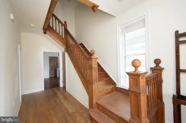 a kitchen with stainless steel appliances a refrigerator and cabinets