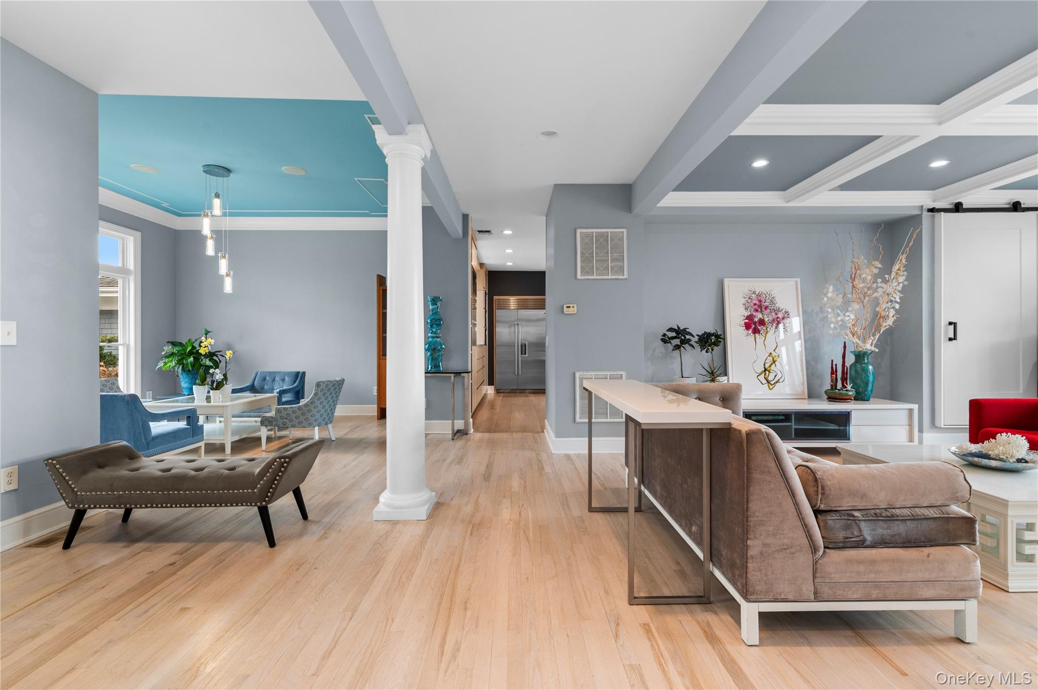14 South Country Road Westhampton, NY 11977 - Photo 6 of 45 a living room with furniture and a wooden floor