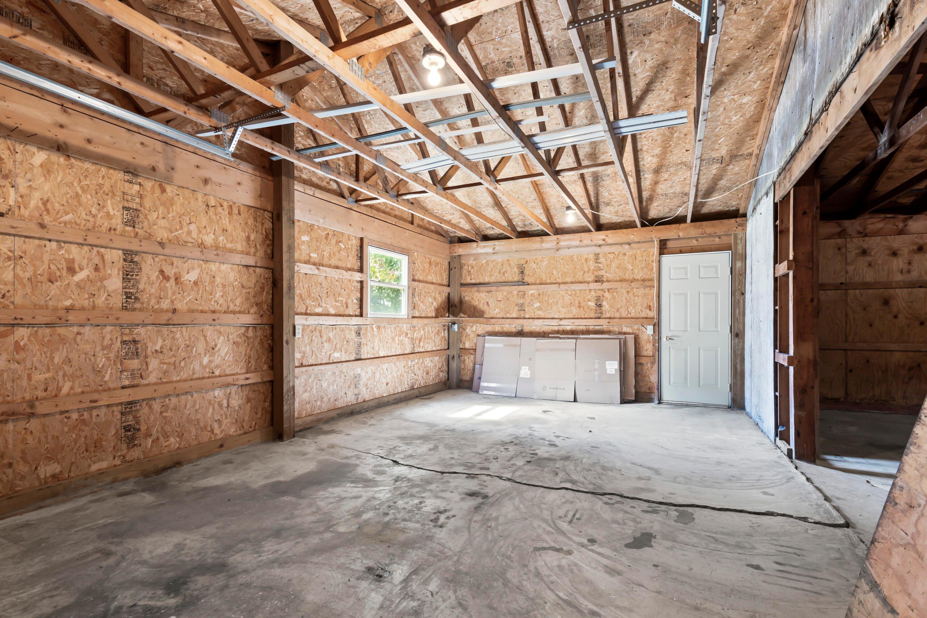 5764 Cheshire Road Galena, OH 43021 - Photo 45 of 59 • Vinyl exterior
• Concrete floor
• Loft area
• Service door
• Electric from house
• (2) garage doors
• Cabinets