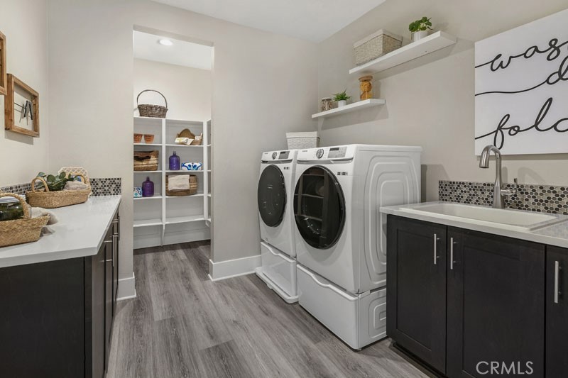6517 Canyon Oaks Drive Simi Valley, CA 93063 - Photo 13 of 35 a utility room with sink dryer and washer