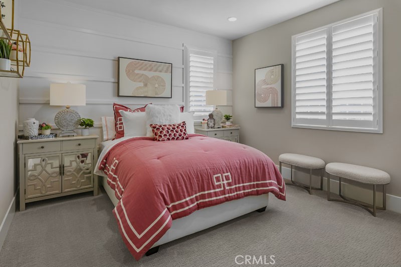 6517 Canyon Oaks Drive Simi Valley, CA 93063 - Photo 16 of 35 a spacious bedroom with a bed and a couch