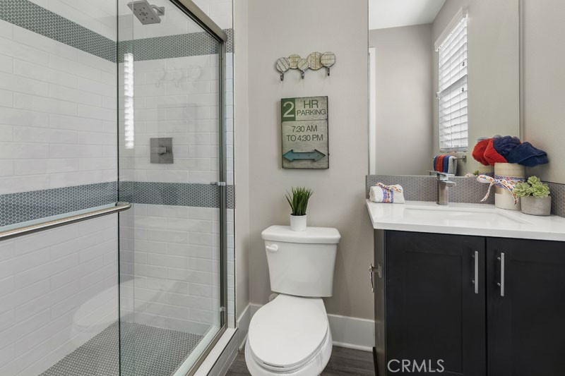6517 Canyon Oaks Drive Simi Valley, CA 93063 - Photo 18 of 35 a bathroom with a sink toilet and shower