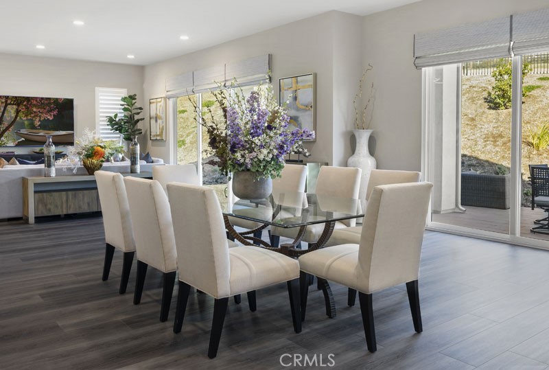 6517 Canyon Oaks Drive Simi Valley, CA 93063 - Photo 2 of 35 a view of a dining room with furniture window and wooden floor