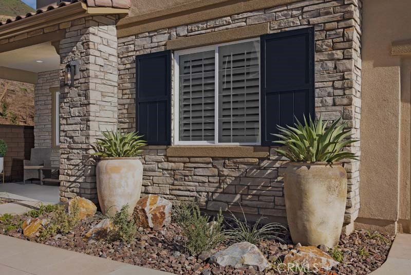 6517 Canyon Oaks Drive Simi Valley, CA 93063 - Photo 34 of 35 a view of house with potted plant
