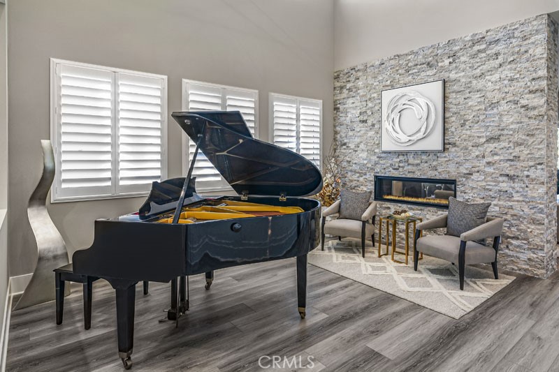 6517 Canyon Oaks Drive Simi Valley, CA 93063 - Photo 5 of 35 a living room with furniture and wooden floor