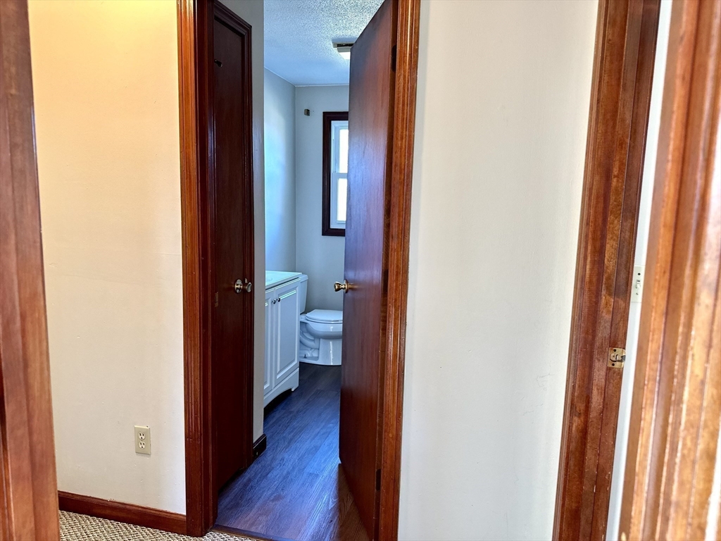 153-155 Arnold Avenue Springfield, MA 01119 - Photo 13 of 17 a view of a bathroom from the hallway