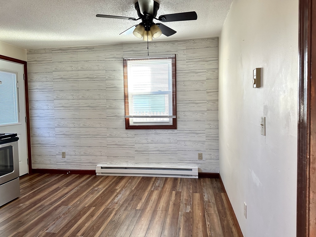 153-155 Arnold Avenue Springfield, MA 01119 - Photo 3 of 17 a view of a hardwood & staircase in a room