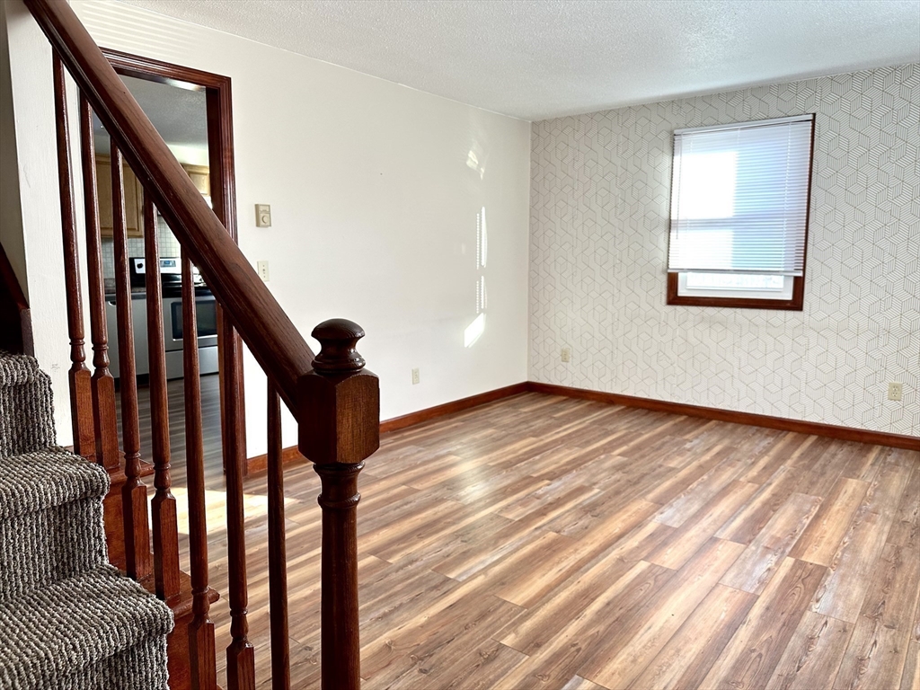 153-155 Arnold Avenue Springfield, MA 01119 - Photo 8 of 17 a view of an entryway with wooden floor