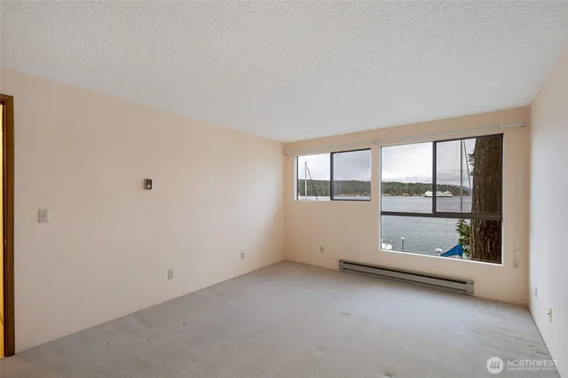 an empty room with a large window