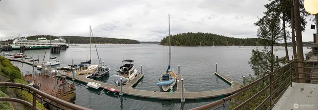 a view of a lake with a sitting area