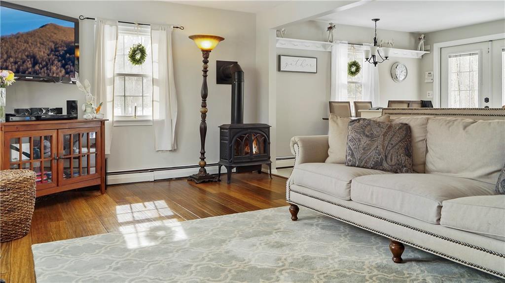 168 Chases Pond Road York, ME 03909 - Photo 7 of 20 Spacious living room with gas parlor...