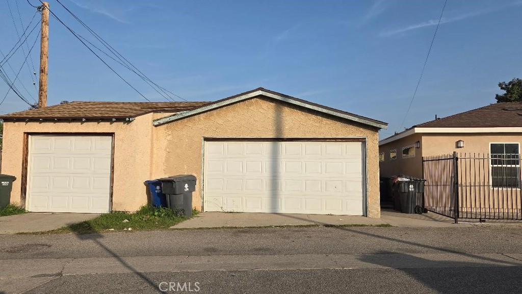 5833 Bonfair Avenue Lakewood, CA 90712 - Photo 13 of 18 2 garages: on two car and one single car. Laundry Hookups in single car garage
