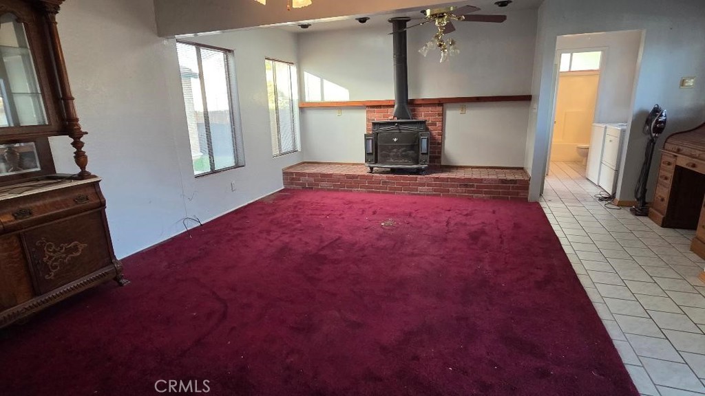 5833 Bonfair Avenue Lakewood, CA 90712 - Photo 2 of 18 Front residence: living room looking toward the primary suite