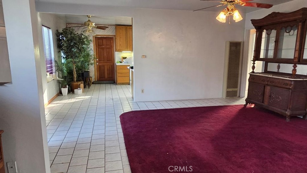 5833 Bonfair Avenue Lakewood, CA 90712 - Photo 5 of 18 Front residence: Returning to the living room toward kitchen