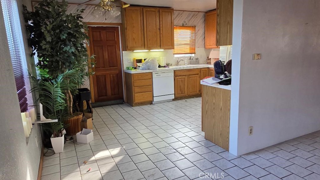 5833 Bonfair Avenue Lakewood, CA 90712 - Photo 6 of 18 Front residence: Entry to Kitchen