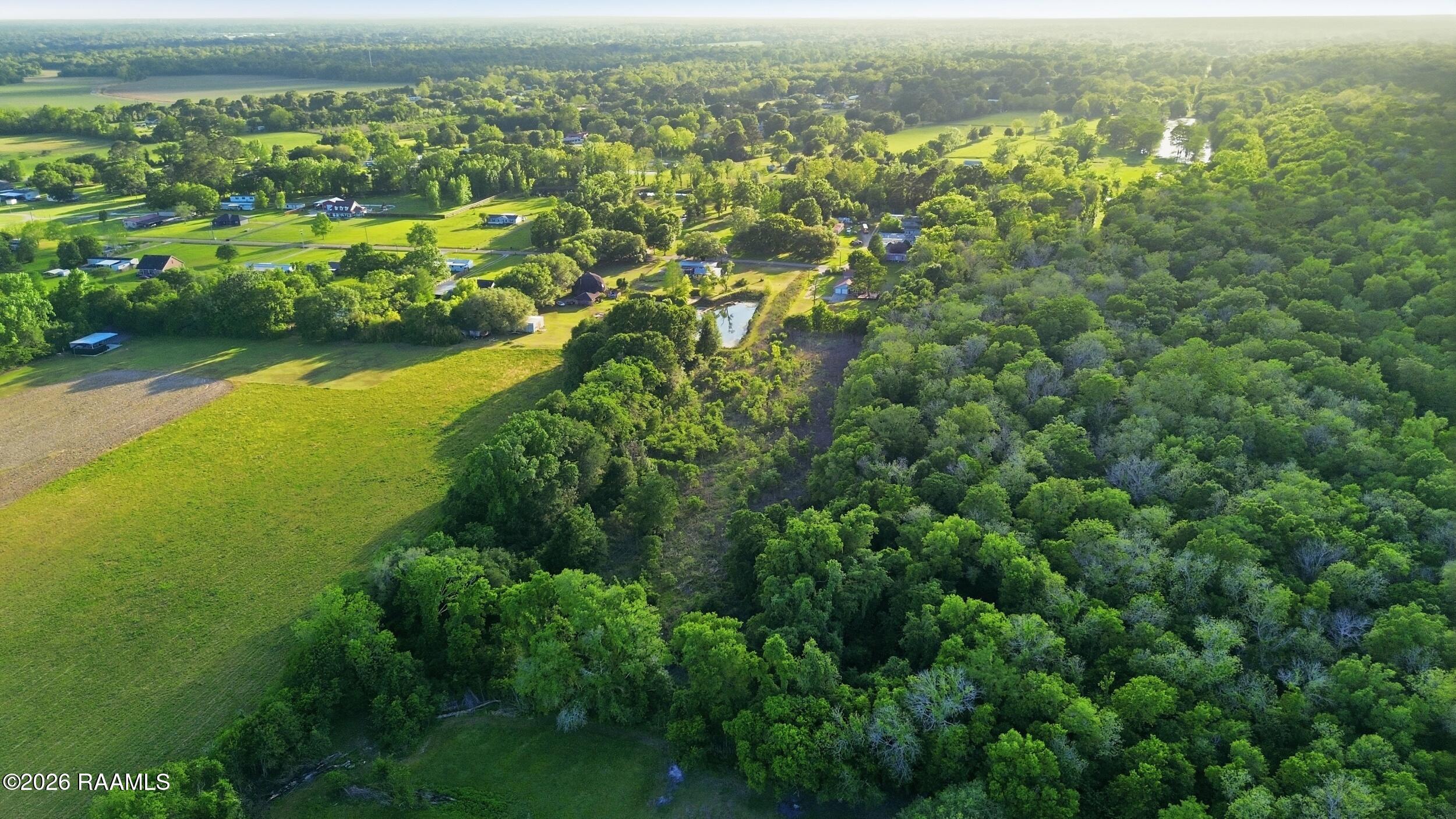 156 Magnifique Road Breaux Bridge, LA 70517 - Photo 31 of 32 30_004_dji_fly_20260415_182024_454_17762
