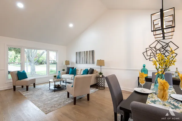 a living room with furniture and a table