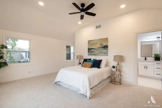 a bedroom with bed and window