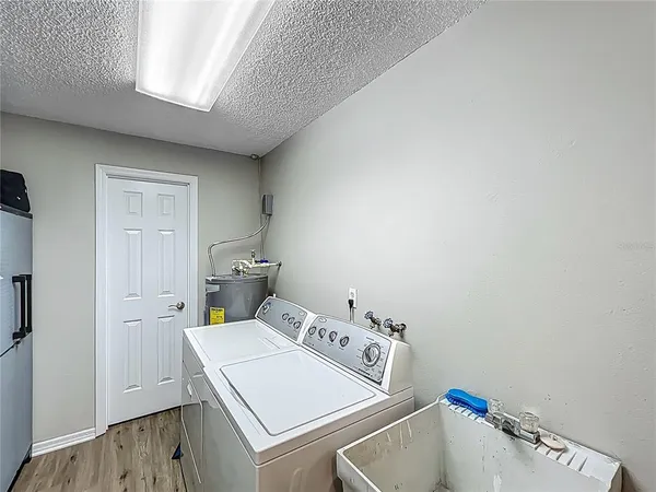 a view of a swimming pool with a backyard