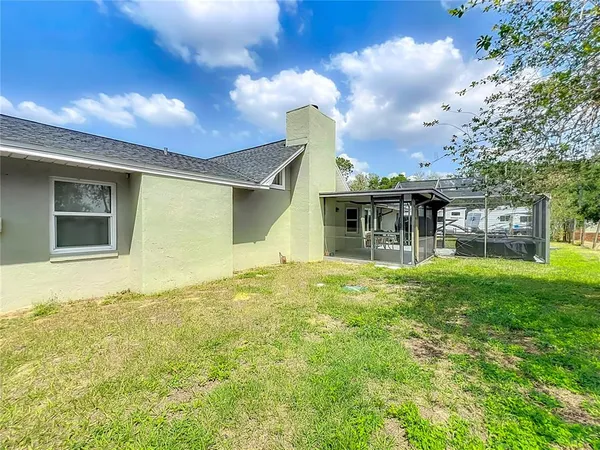 a swimming pool with a yard