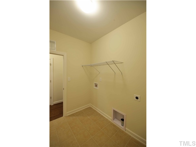 3019 Red Grape Drive Raleigh, NC 27607 - Photo 20 of 22 a bathroom with a shower and a sink