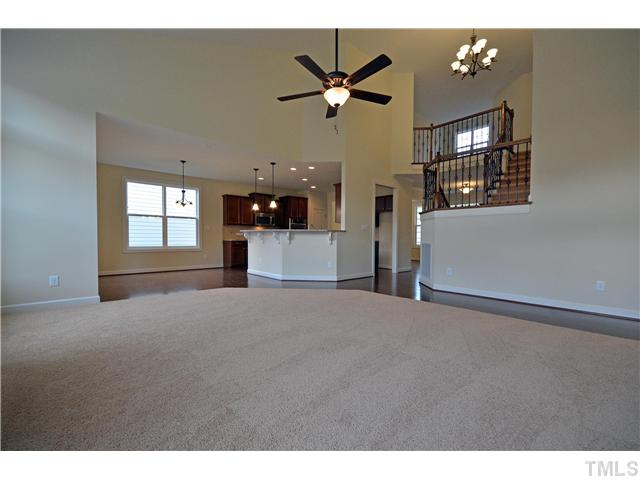 3019 Red Grape Drive Raleigh, NC 27607 - Photo 5 of 22 a view of a livingroom with a ceiling fan and window