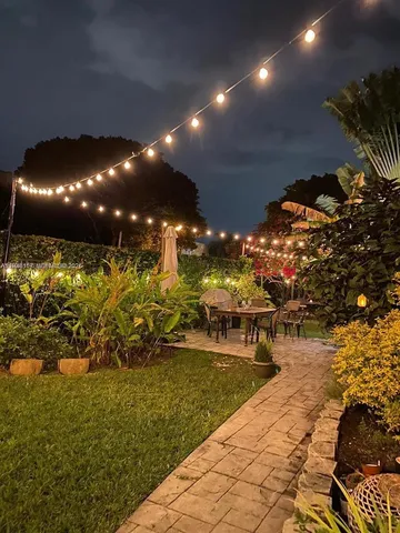 a view of a swimming pool with sitting area