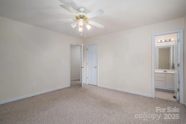 an empty room with a bathroom