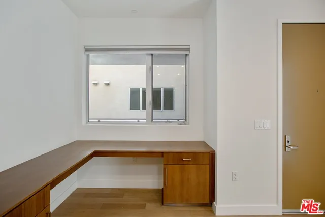 a bathroom with a tub and a sink