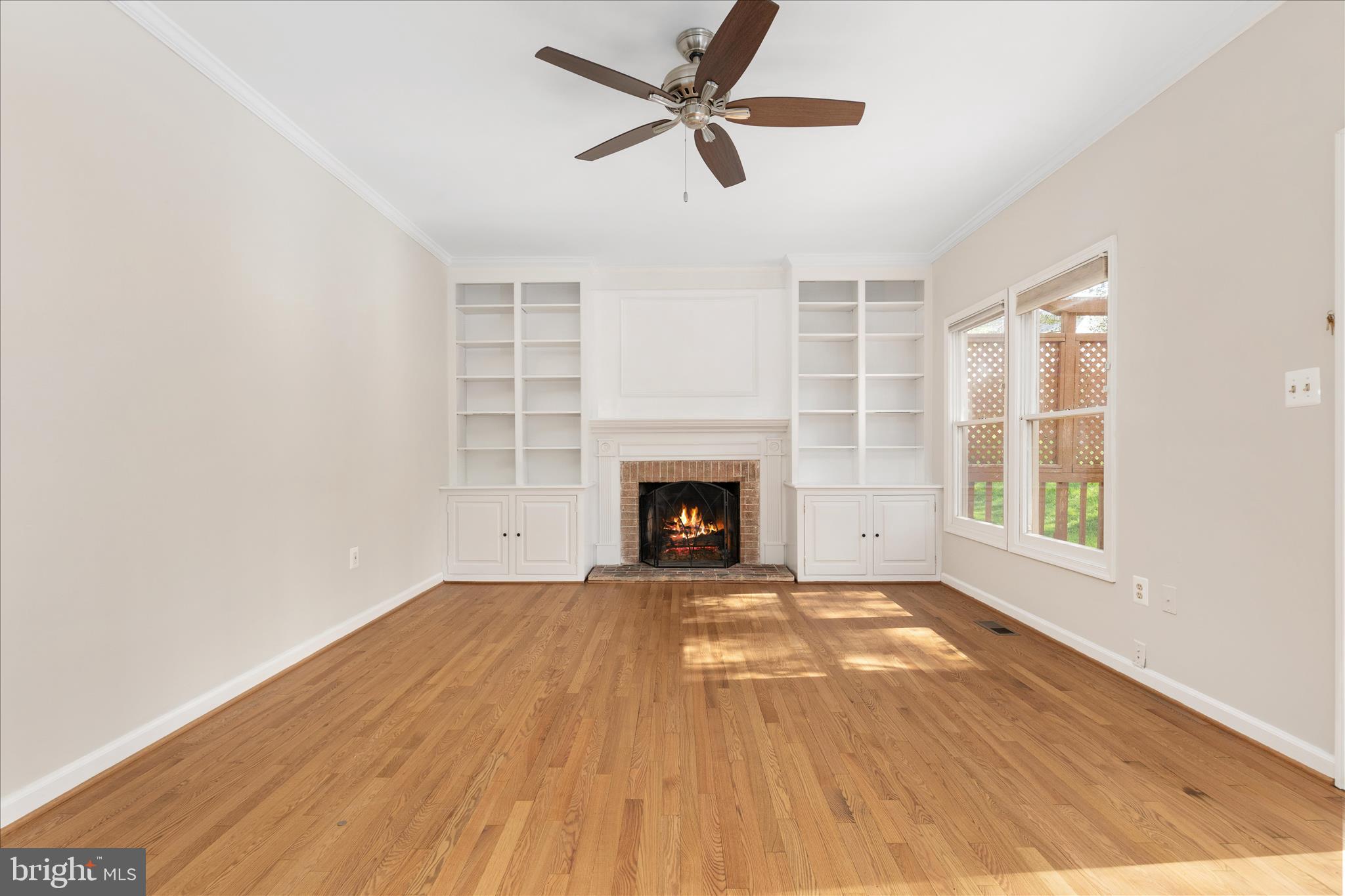 7917 Donegal Lane Springfield, VA 22153 - Photo 18 of 55 Kitchen-adjacent family room with fireplace