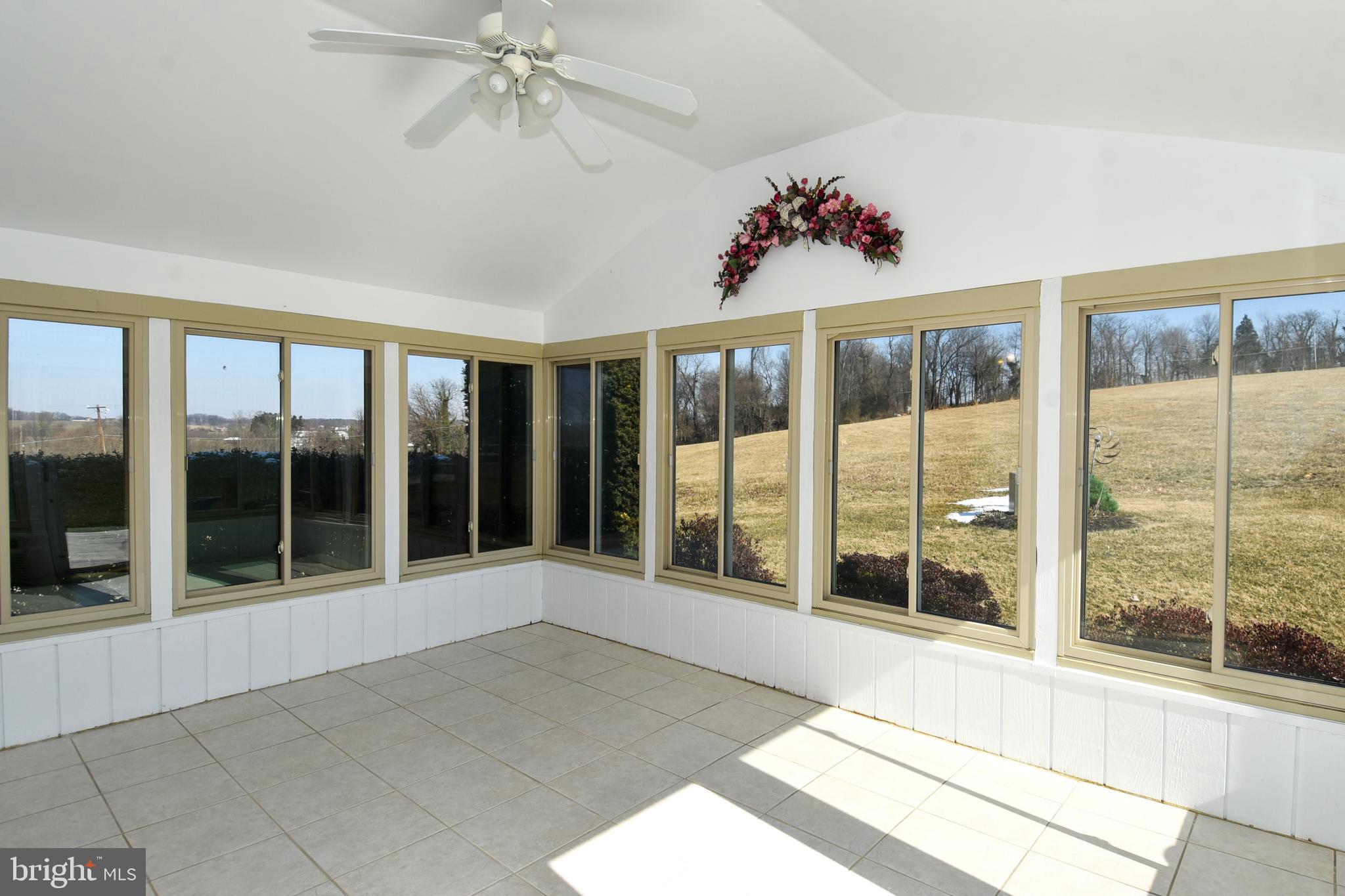 27111 Purdum Road Damascus, MD 20872 - Photo 14 of 84 SUNROOM HAS LIGHTED CEILING FAN