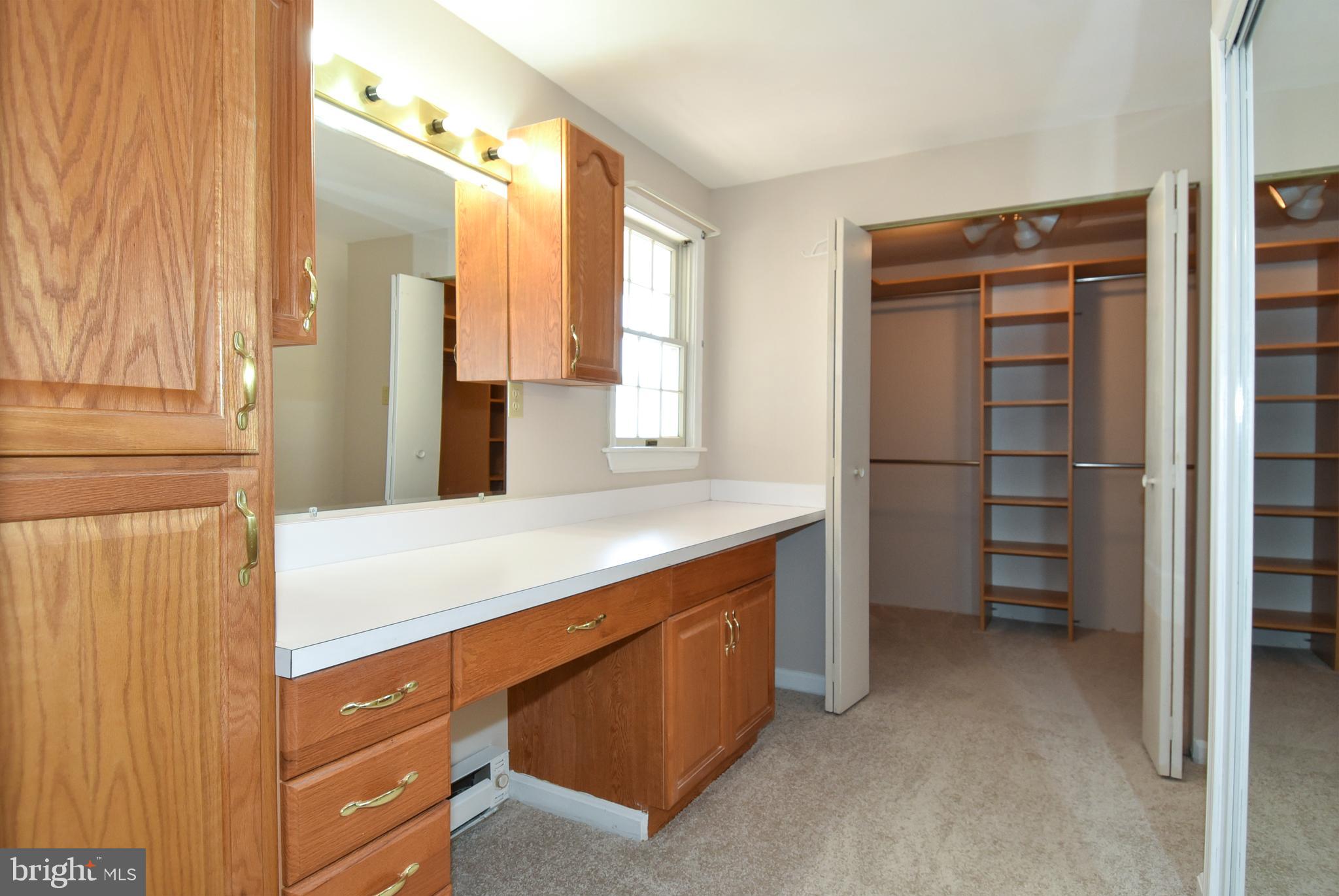 27111 Purdum Road Damascus, MD 20872 - Photo 26 of 84 PRIMARY BATHROOM BUILT-IN VANITY & DRESSING ROOM