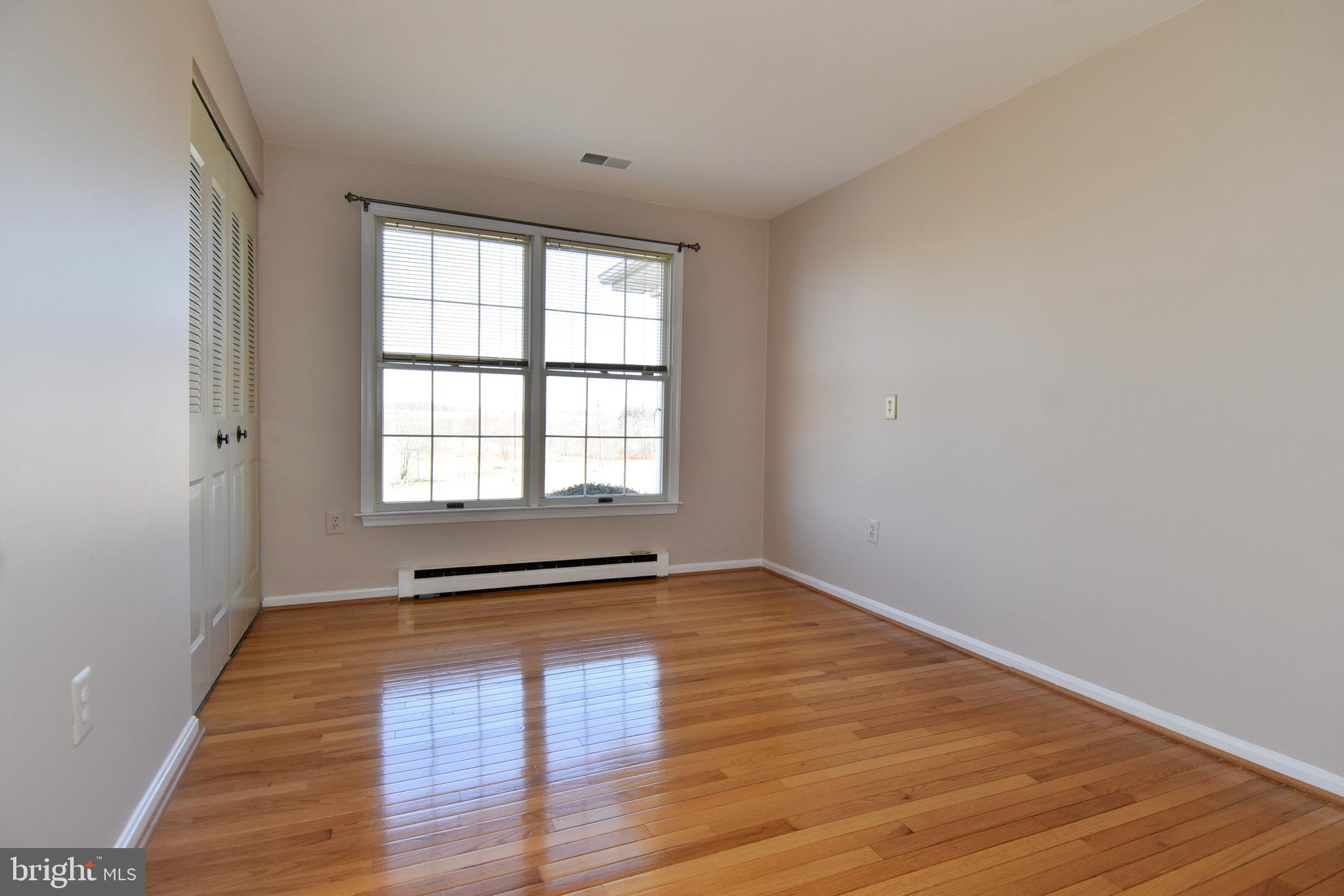 27111 Purdum Road Damascus, MD 20872 - Photo 36 of 84 MAIN LEVEL BEDROOM 3 HAS HARDWOOD FLOORING