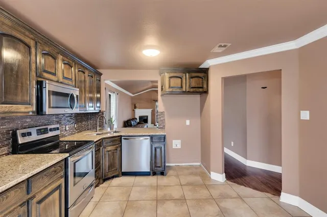 a view of an entryway with chandelier