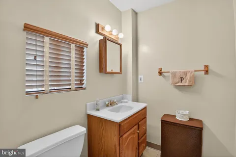 a kitchen with stainless steel appliances a stove a sink and a refrigerator