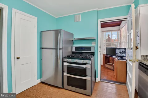 a view of kitchen with livingroom