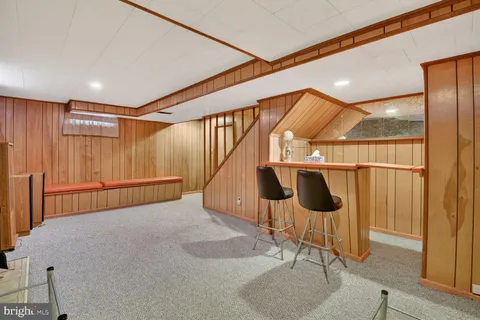 a bed room with a bed and a window