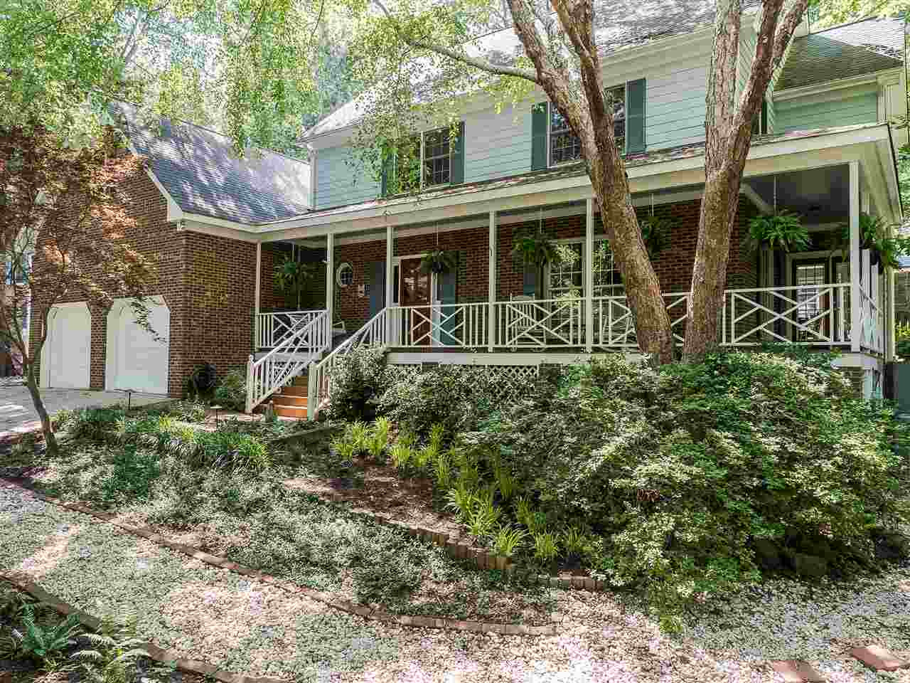5117 Carter Street Raleigh, NC 27612 - Photo 25 of 25 One of the gravel paths that leads to one of the TWO patios. One features a water garden. Great Established Neighborhood