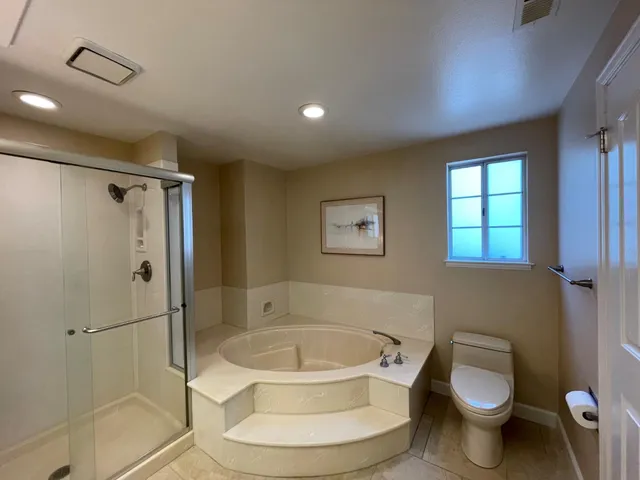 a bathroom with a sink a mirror and a shower