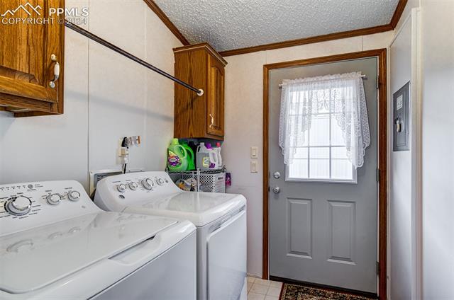 34170 Big Springs Road Yoder, CO 80864 - Photo 28 of 35 Walk out Laundry/Utility Room