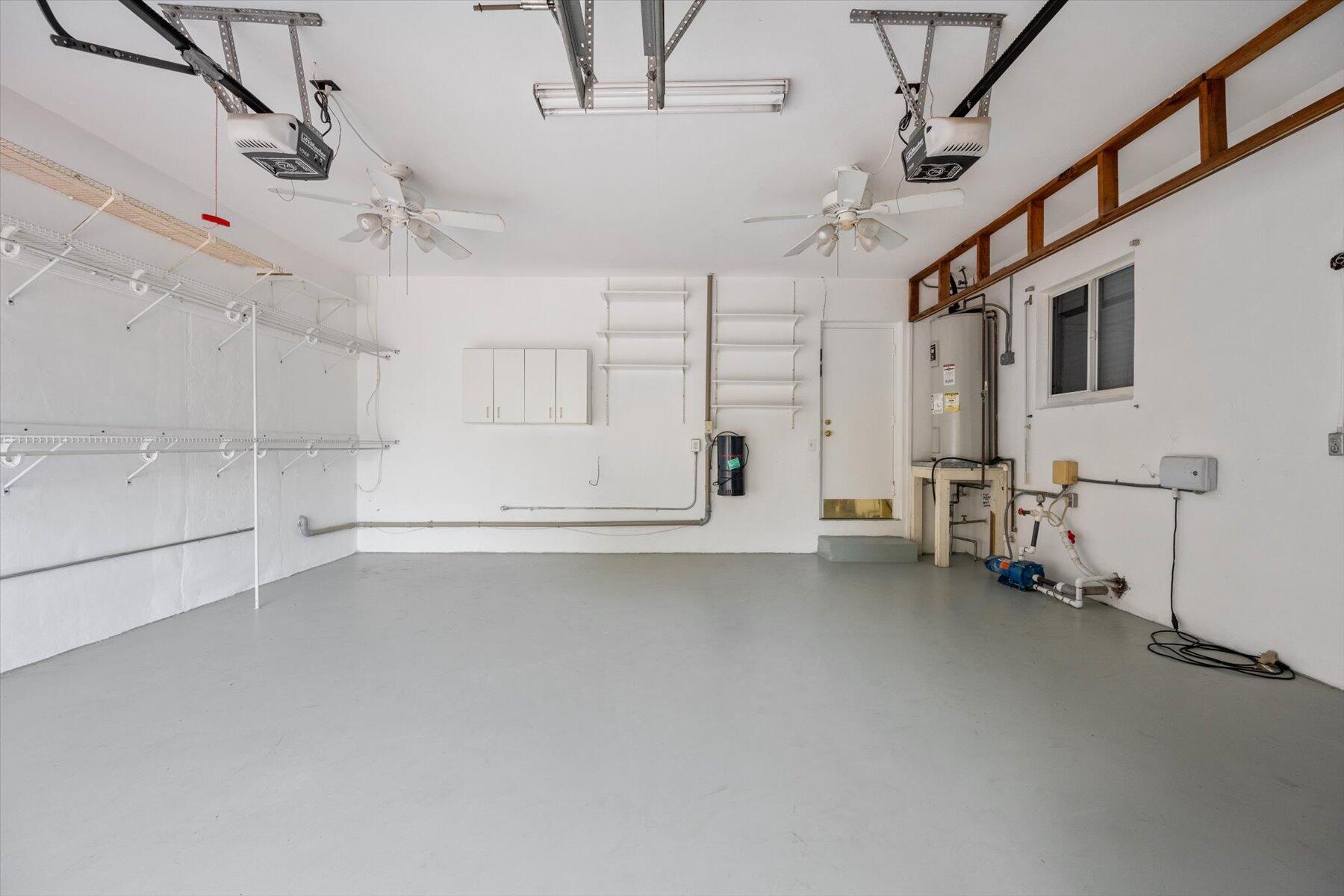 390 Neptune Road Juno Beach, FL 33408 - Photo 23 of 32 Oversized 2-car garage