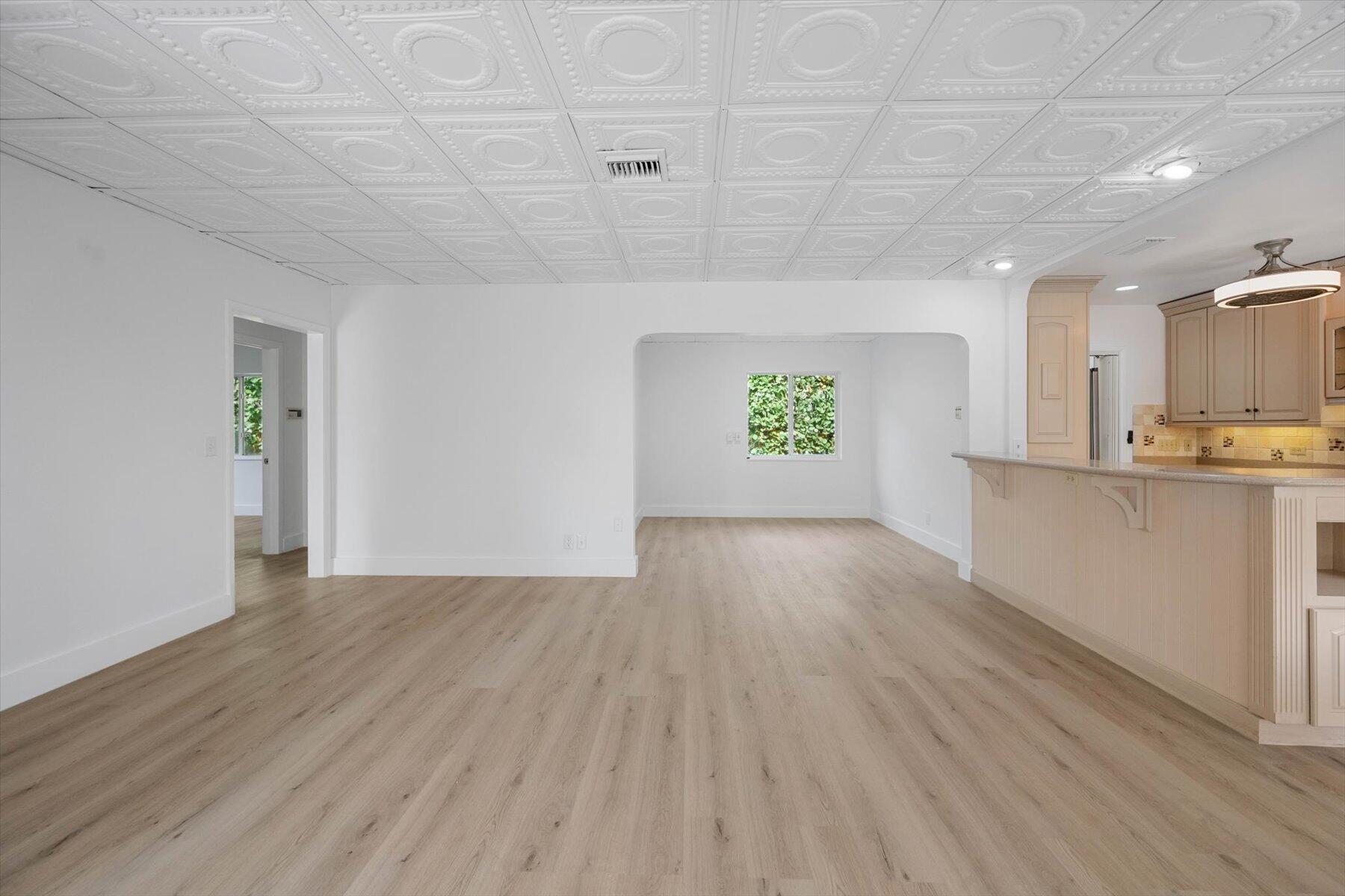 390 Neptune Road Juno Beach, FL 33408 - Photo 3 of 32 Open, light & bright freshly painted