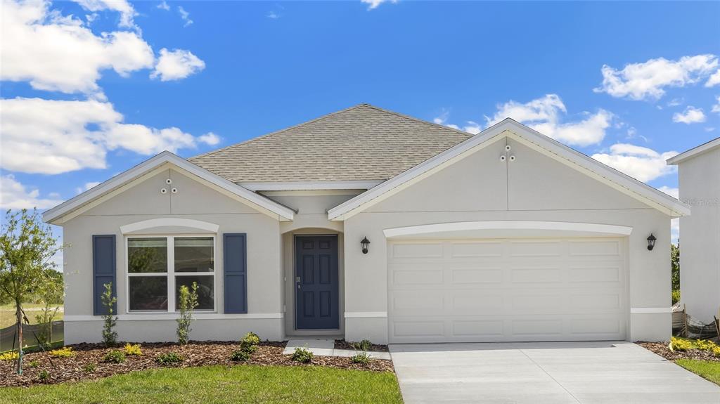 12512 Rolling Shls Place Parrish, FL 34219 - Photo 1 of 1 a view of a house with a yard