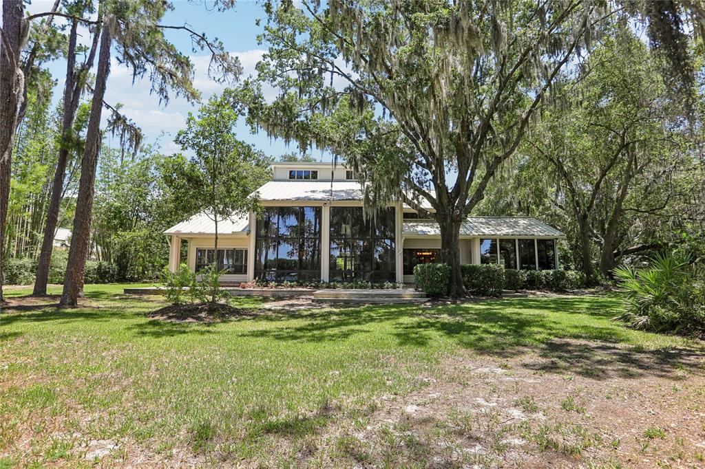 17810 Crawley Road Odessa, FL 33556 - Photo 56 of 76 a front view of a house with a yard