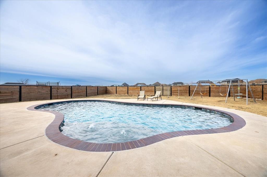10251 Finch Road Sanger, TX 76266 - Photo 26 of 39 20,000 gallon pool with sun shelf 4ft. to 8ft. deep