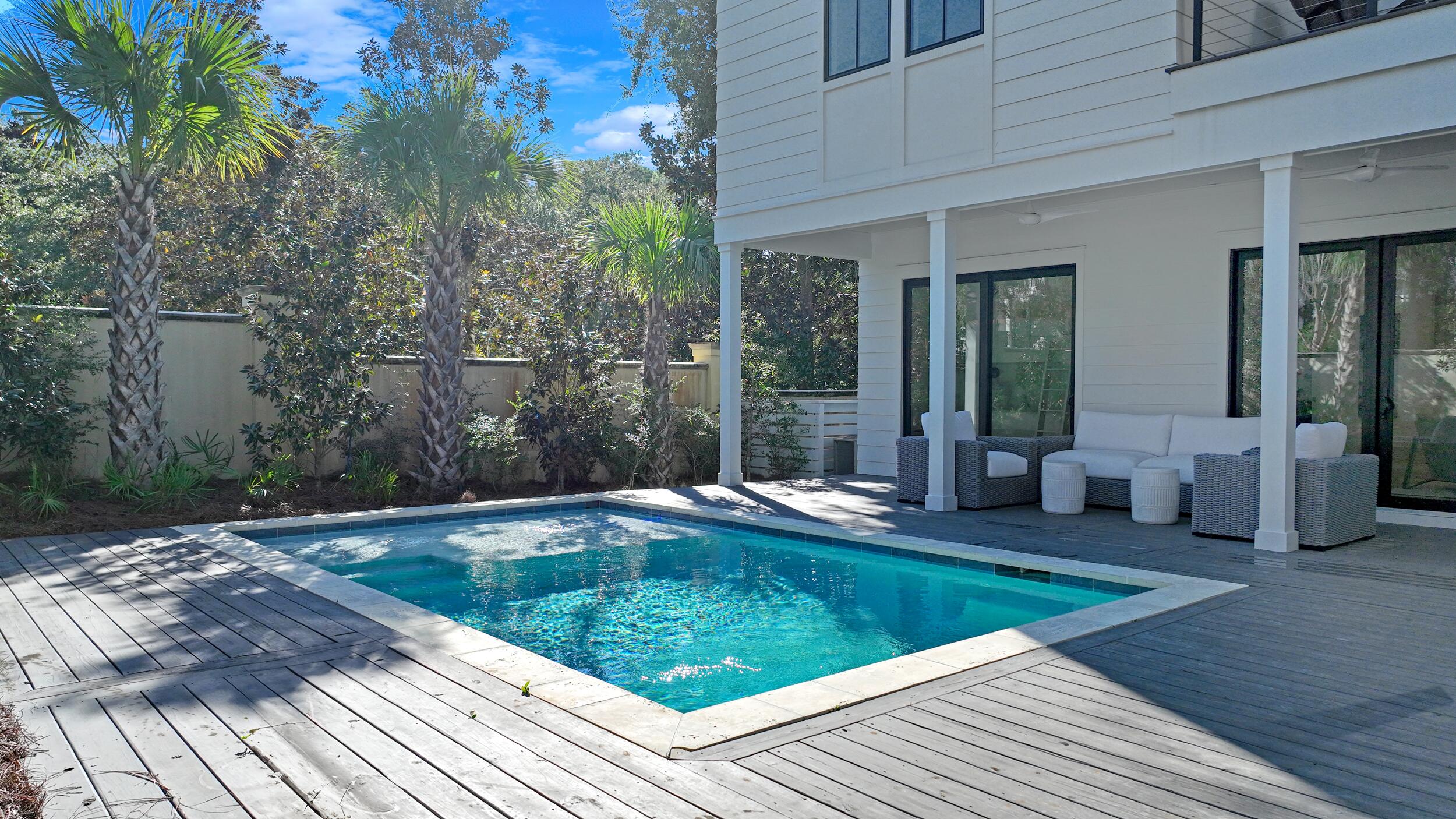 91 Grande Pointe Drive Inlet Beach, FL 32461 - Photo 3 of 51 a swimming pool with yard in front of it