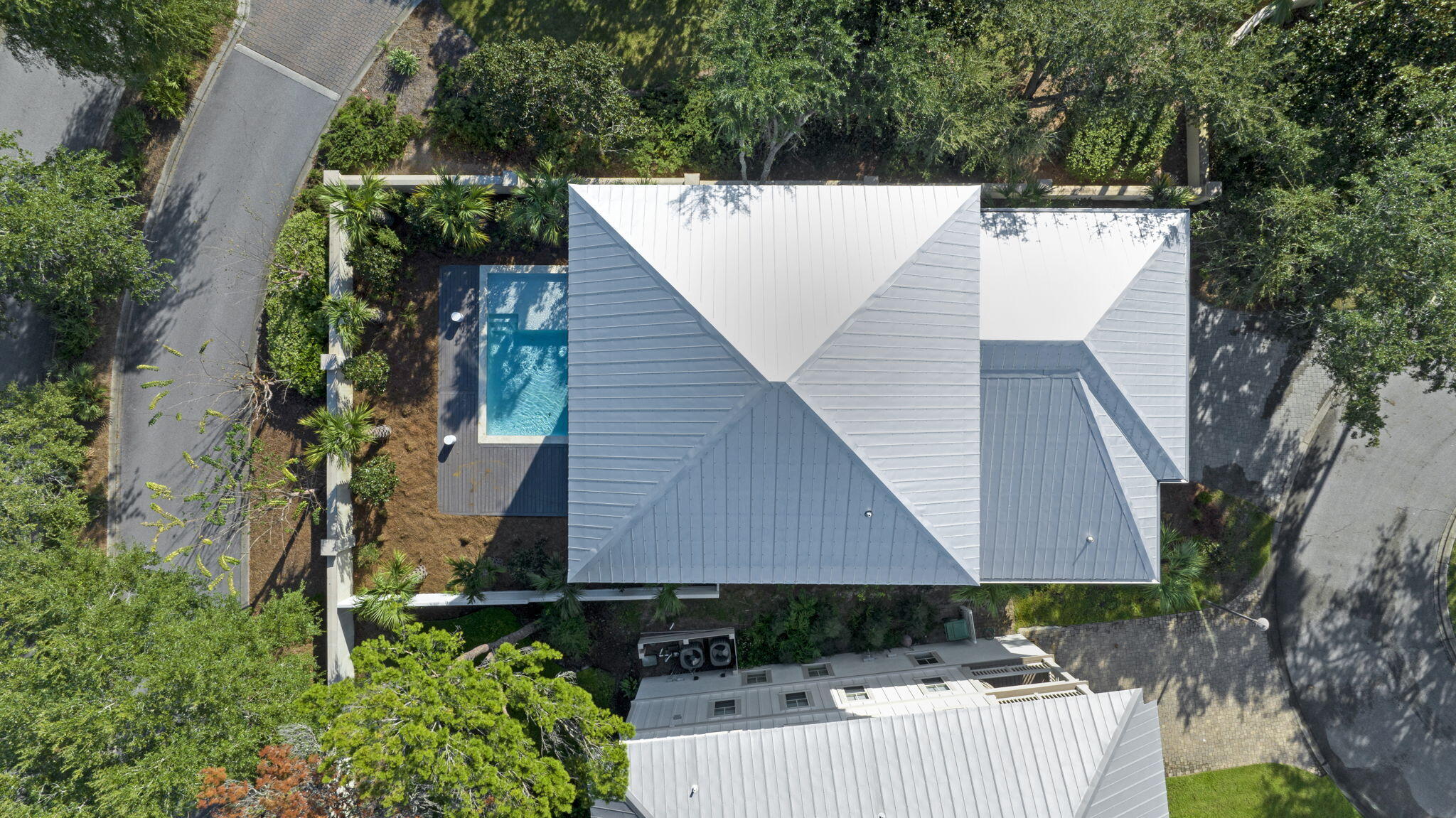91 Grande Pointe Drive Inlet Beach, FL 32461 - Photo 41 of 51 an aerial view of a house with a yard and potted plants