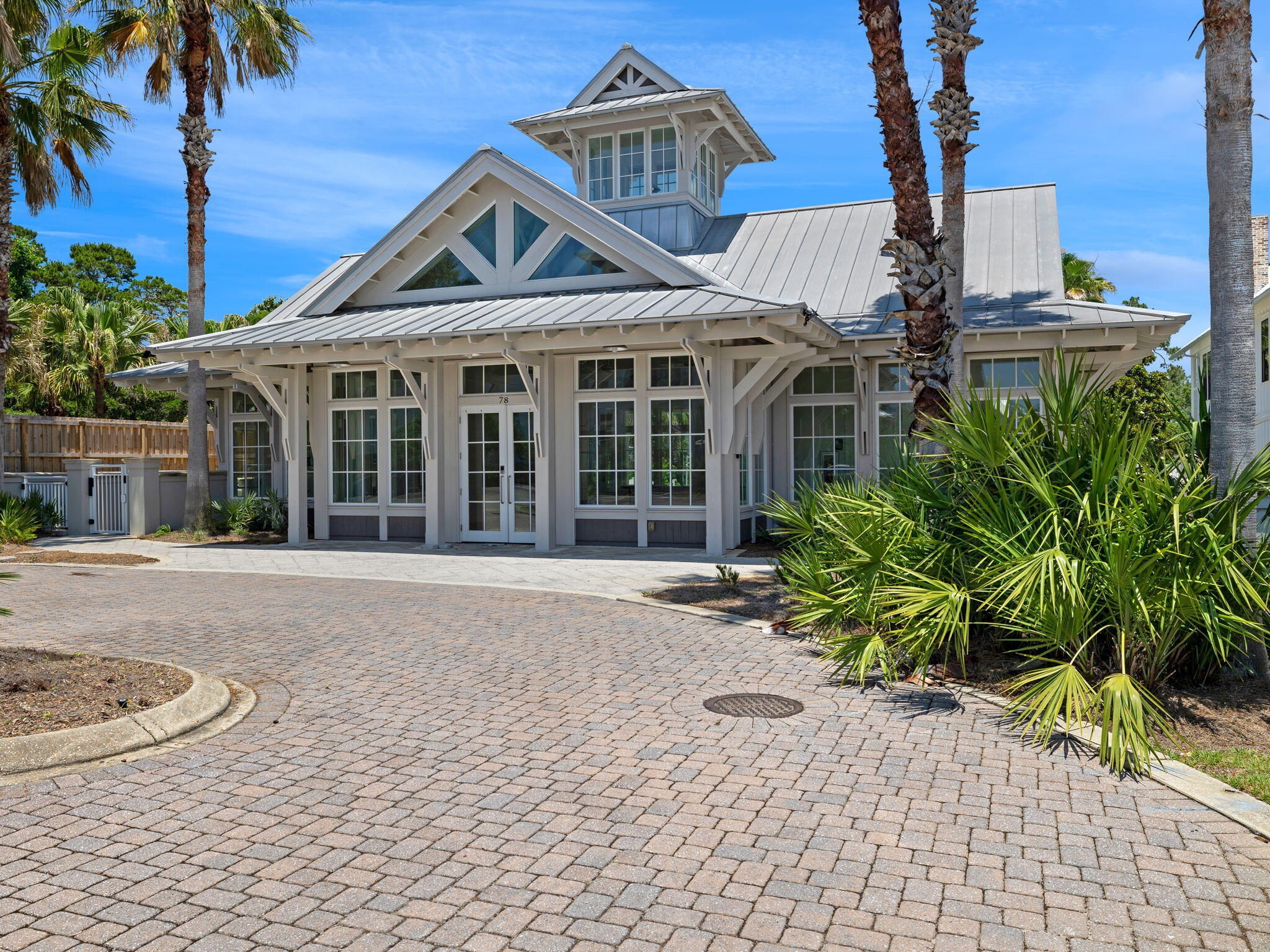 91 Grande Pointe Drive Inlet Beach, FL 32461 - Photo 47 of 51 a front view of a house with a garden