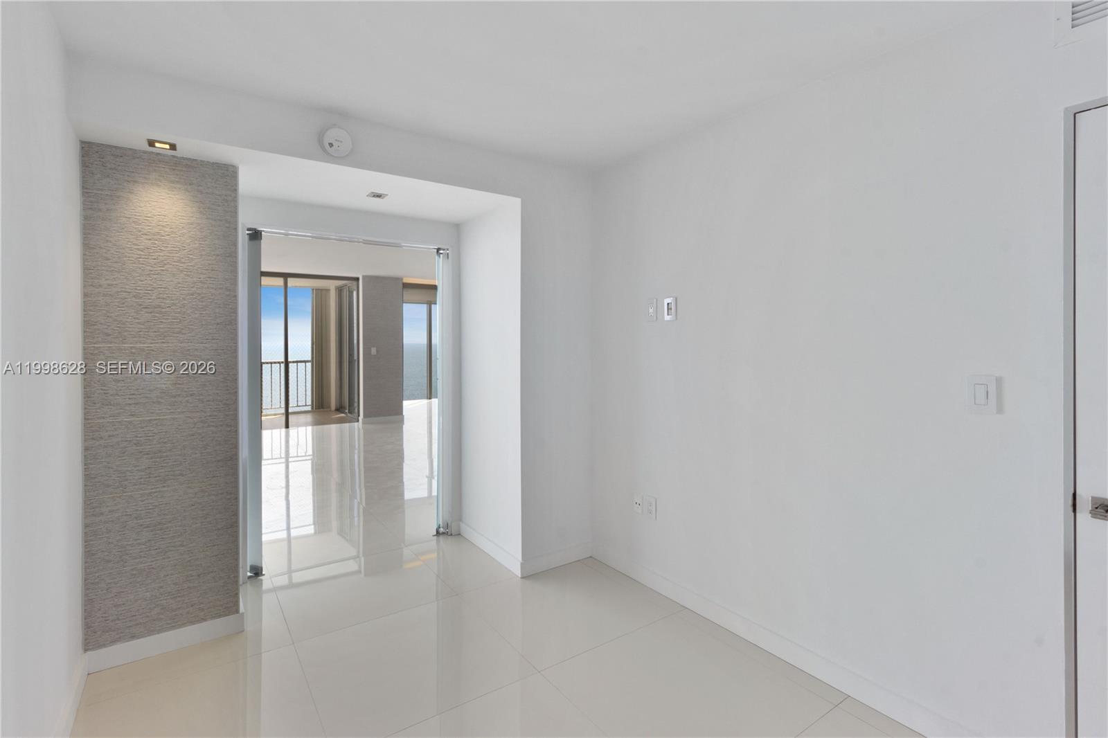 881 Ocean Drive, Unit 18F Key Biscayne, FL 33149 - Photo 6 of 12 a view of an empty room